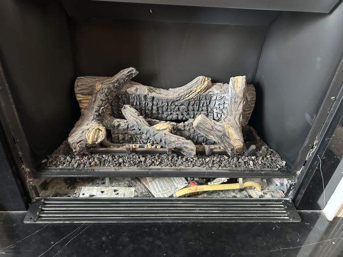 Worn gas log set before service